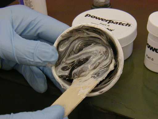 Using the supplied stick, the Part A and Part B materials are stirred in the Part A cup.