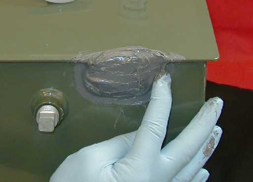 Use wet fingers to smooth and taper the sealant. Seals can be sanded for additional aesthetics once dry.