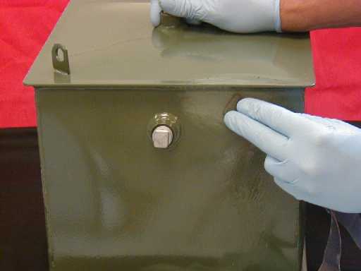 The area surrounding the leak is sanded with the supplied PowerPatch® Abrasive Cloth.