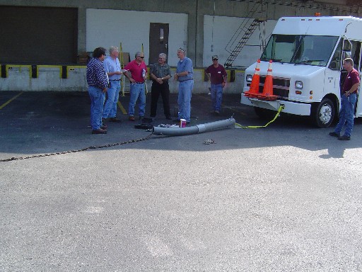 One end of the polyethylene conduit section and PVC coupler combination is now attached to the front bumper of a heavy step van ...