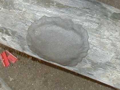 Here, putty has been used to temporarily seal a leak.